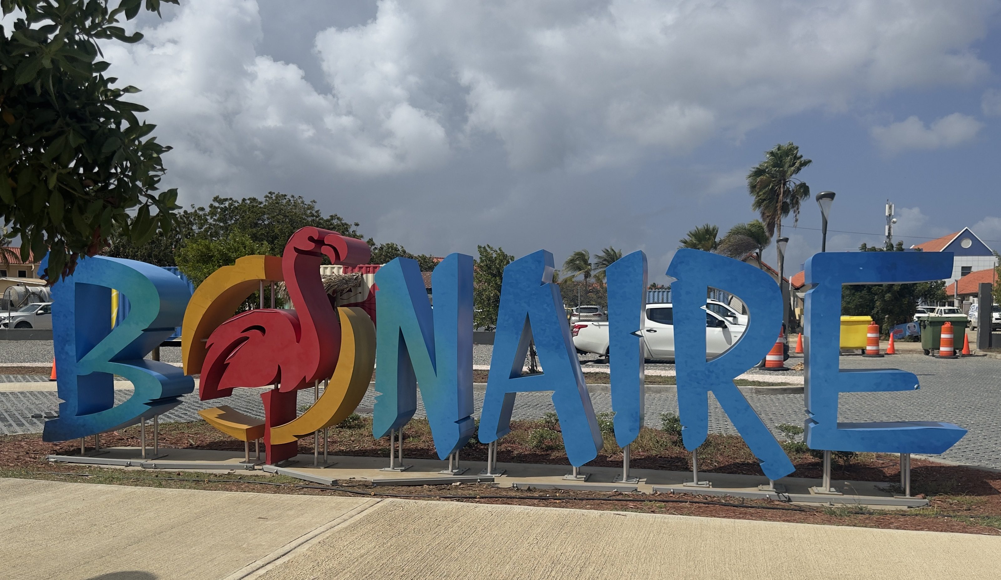 Colorful "Bonaire" sign with flamingo design.